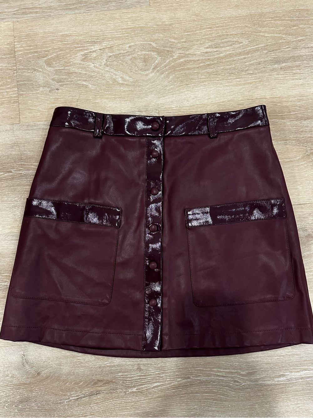 STAUD Gloss Trim Faux Leather Mini Paper Skirt in Burgundy Plum